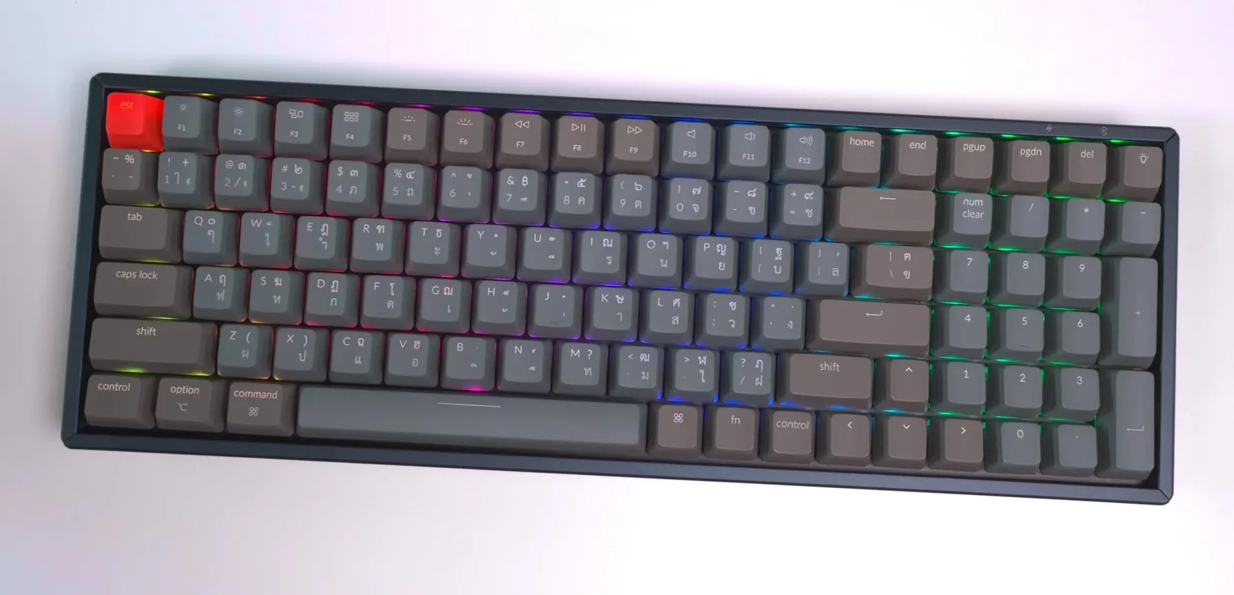 Mechanical keyboard with aluminium frame and grey keycaps, studio render